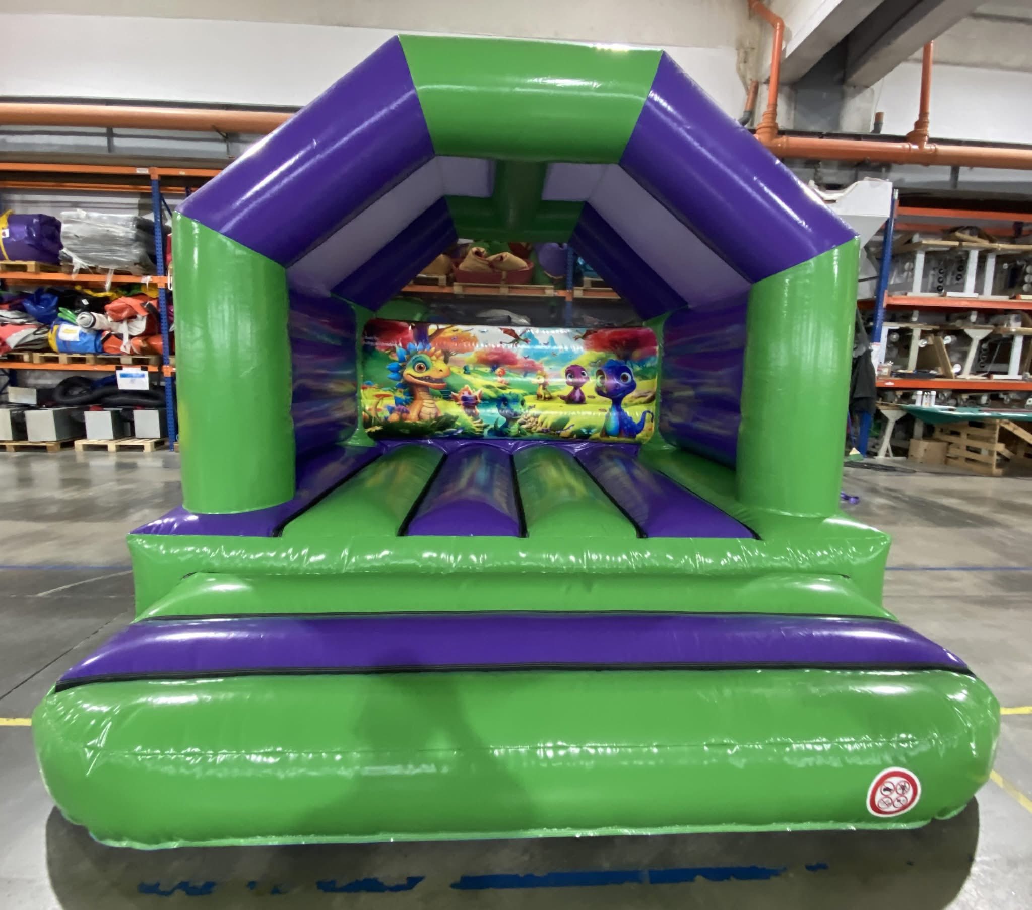 Eight shirts arranged on table in black, olive, grey, blue, white, red, mustard, and green.