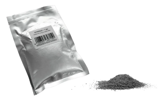 Eight shirts arranged on table in black, olive, grey, blue, white, red, mustard, and green.