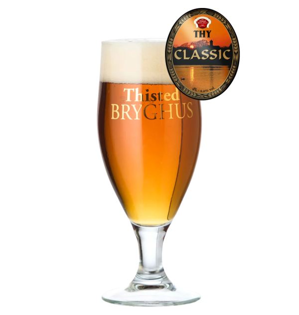 Eight shirts arranged on table in black, olive, grey, blue, white, red, mustard, and green.