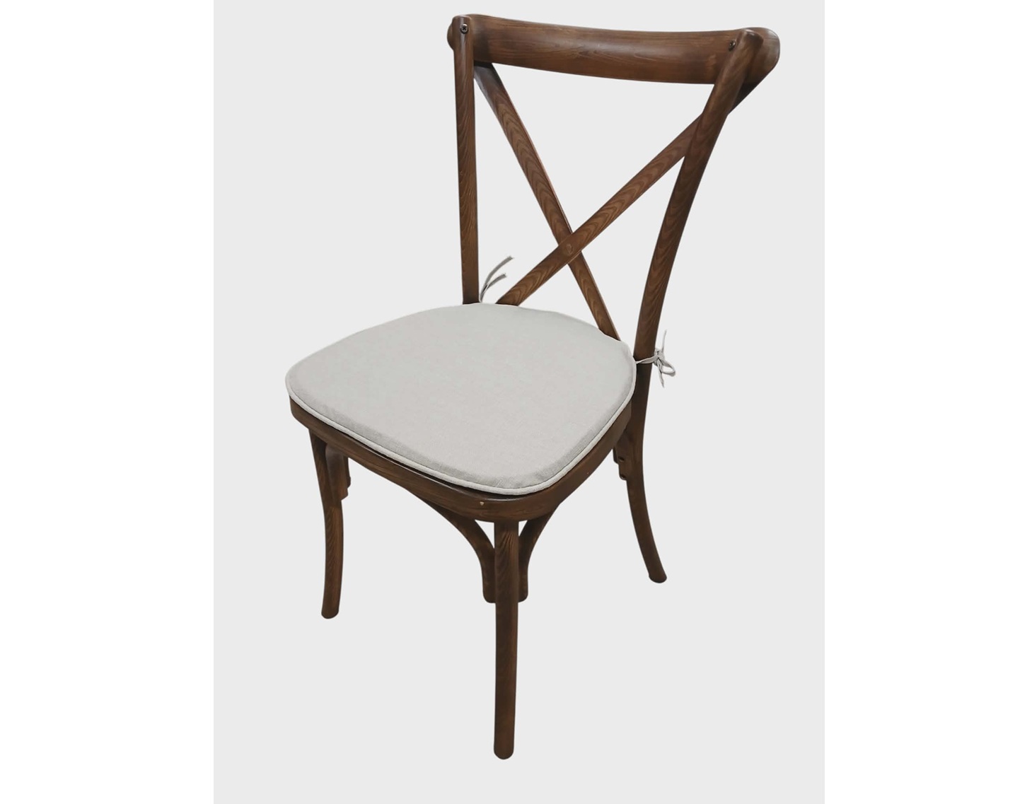 Eight shirts arranged on table in black, olive, grey, blue, white, red, mustard, and green.